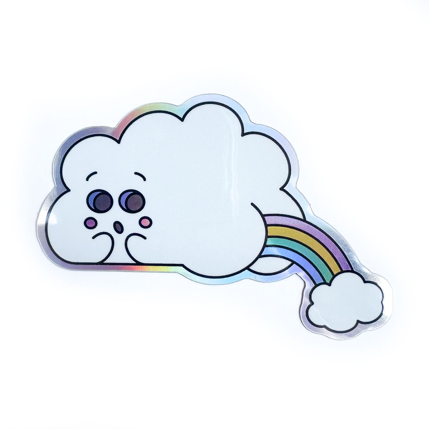 A holographic sticker in the shape of a cute cloud with a little booty that is farting out a rainbow with another cloud.