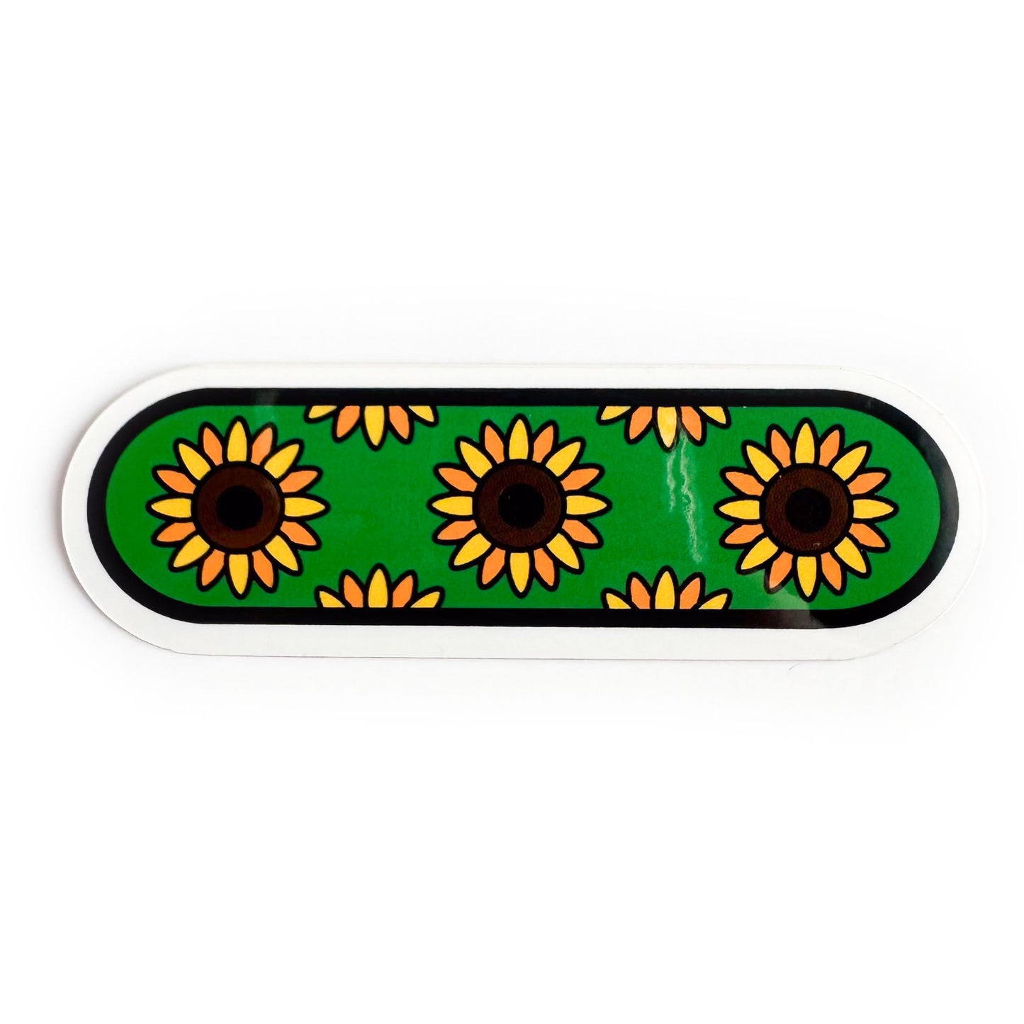 A capsule shaped sticker with illustrations of sunflowers on a green background.