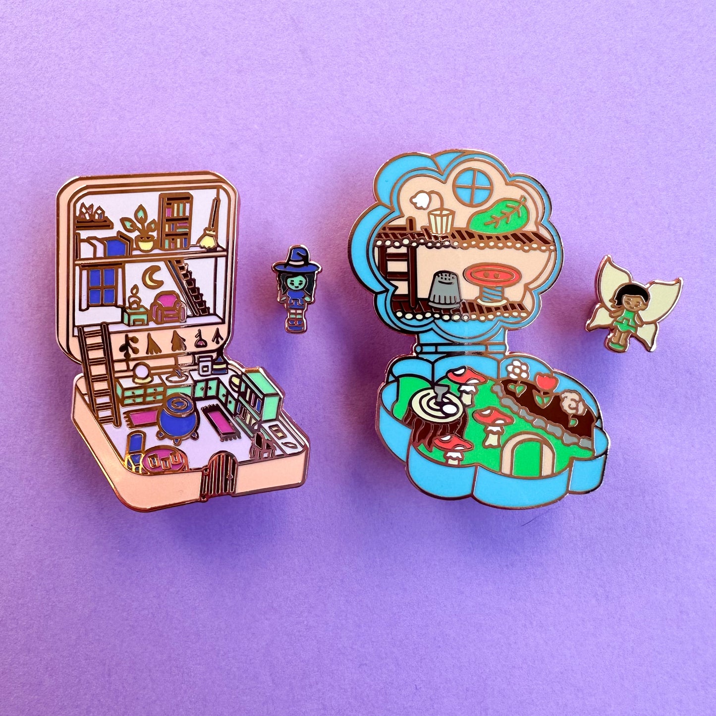 The Witchy Pocket Pin set next to the fairy Pocket Pin Set.