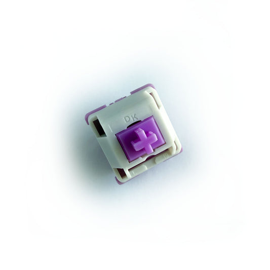 A linear keyboard switch on a white background. The switch component is purple, the bottom of the casing is also purple, and the top of the casing is white with the letters "DK" imprinted into it.