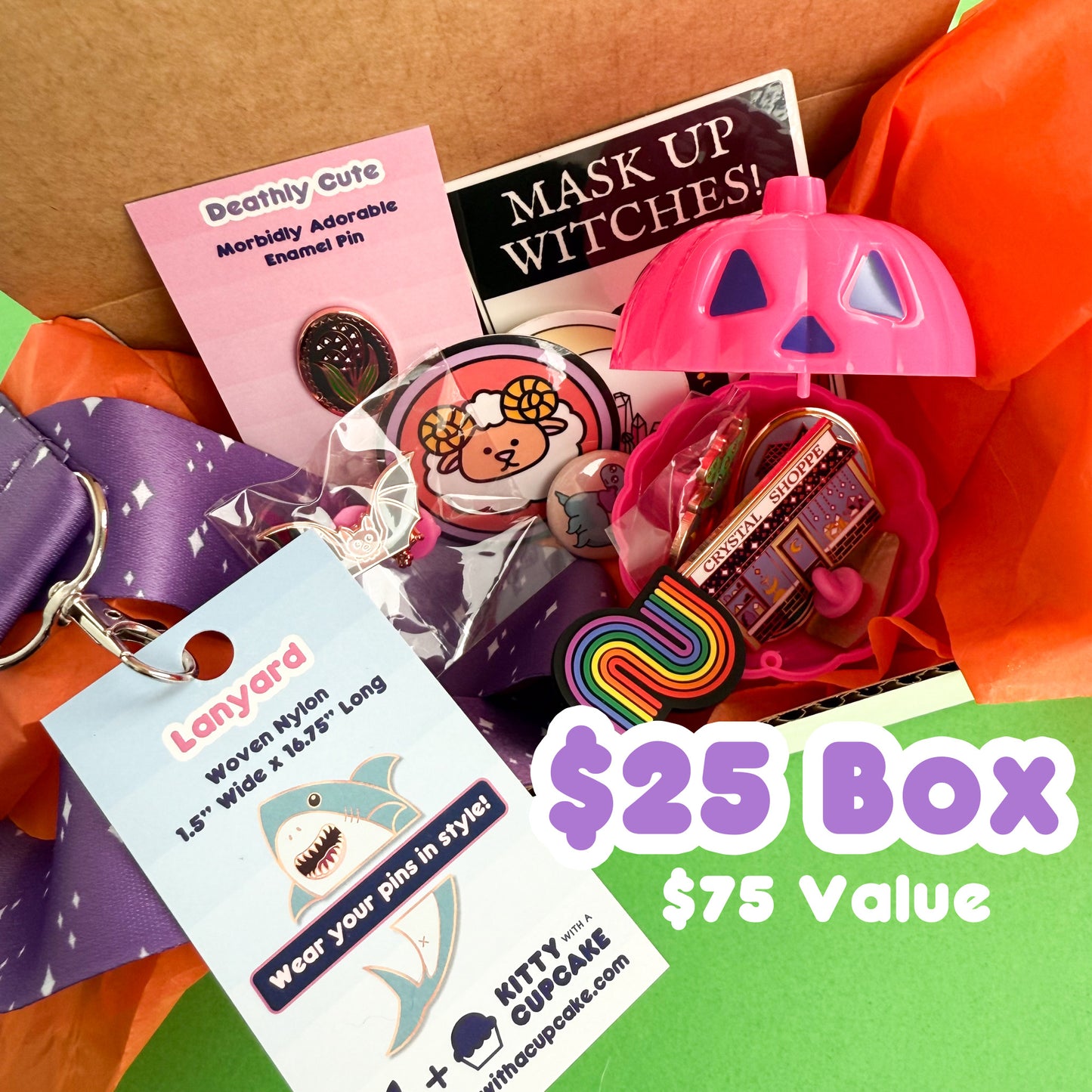 A box packed full of Kitty With A Cupcake items including stickers, pins, charms, big claw clip, and lanyard. There is text reading "$25 Box $75 Value"