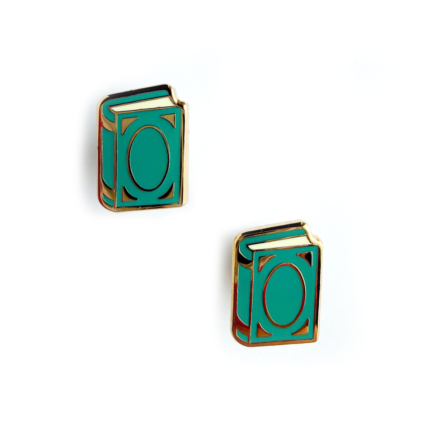 Teal book shaped earrings with gold accents on a white background