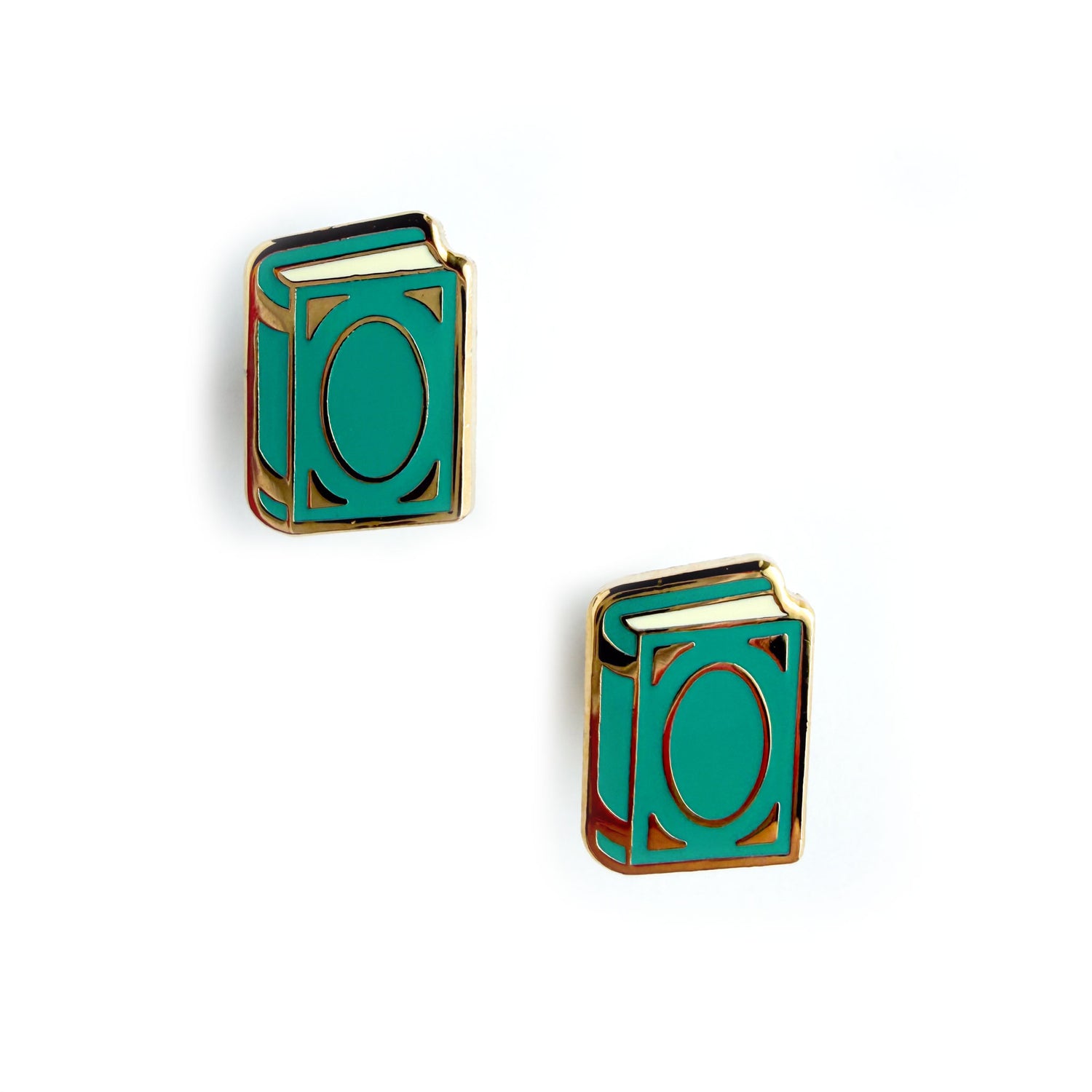 Teal book shaped earrings with gold accents on a white background