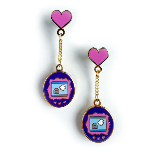 Virtual pet shaped dangle earrings with a gold chain attached to a hot pink heart stud post. The virtual pets have cute little ghosts in them. 