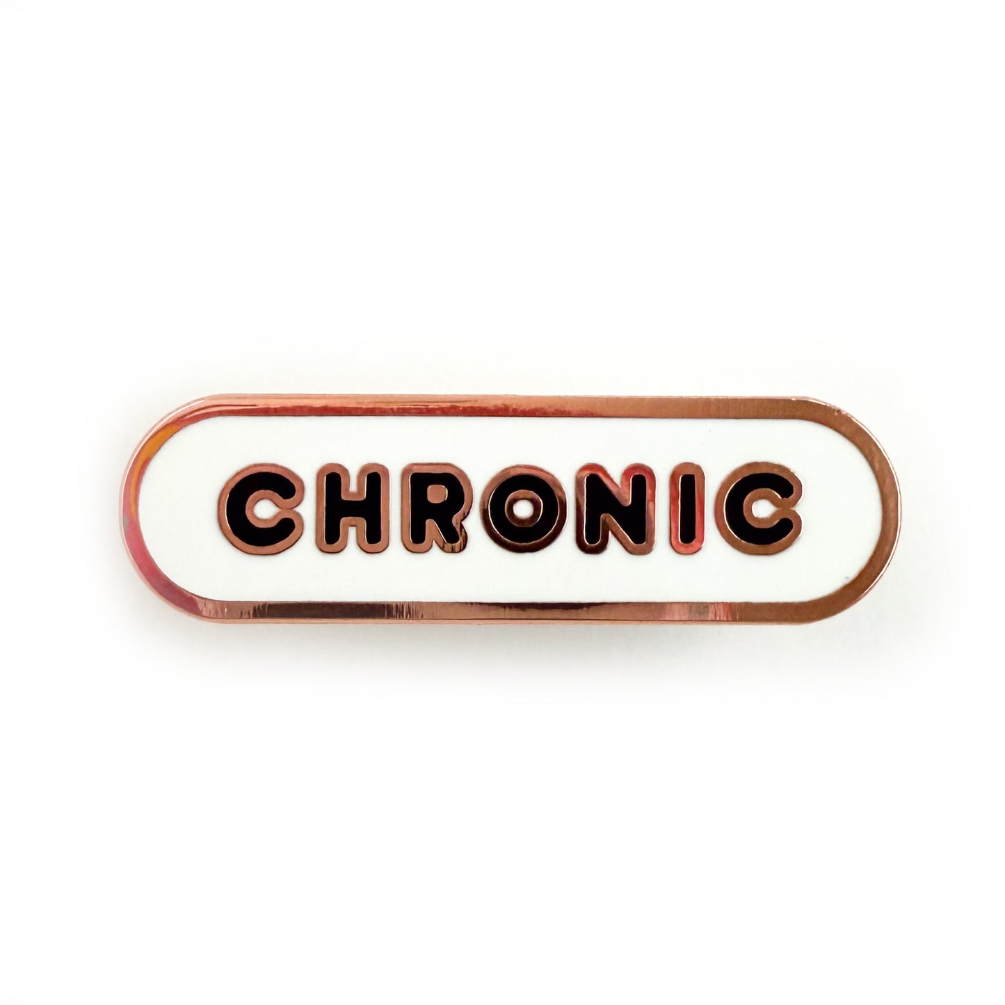 A bandaid shaped pin with the text CHRONIC in bubble letters. The background is white and the text is black.