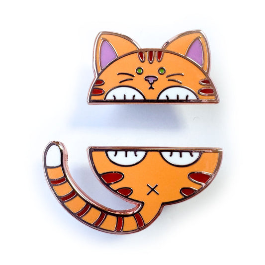Two pins that come together to form the top and bottom half of a cute cat illustration. It is an orange cat with white feet and a white tipped tail. 