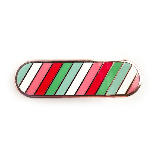 An enamel pin with stripes in the colors of the Abrosexual pride flag in the shape of an oval.