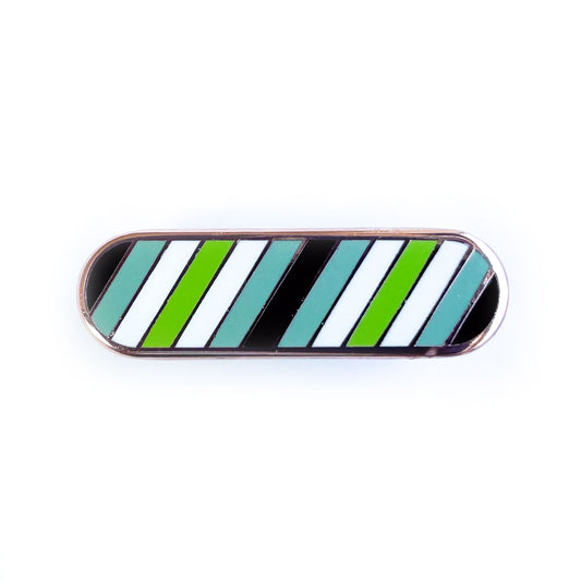 A capsule shaped pin with diagonal stripes of the agender pride flag.