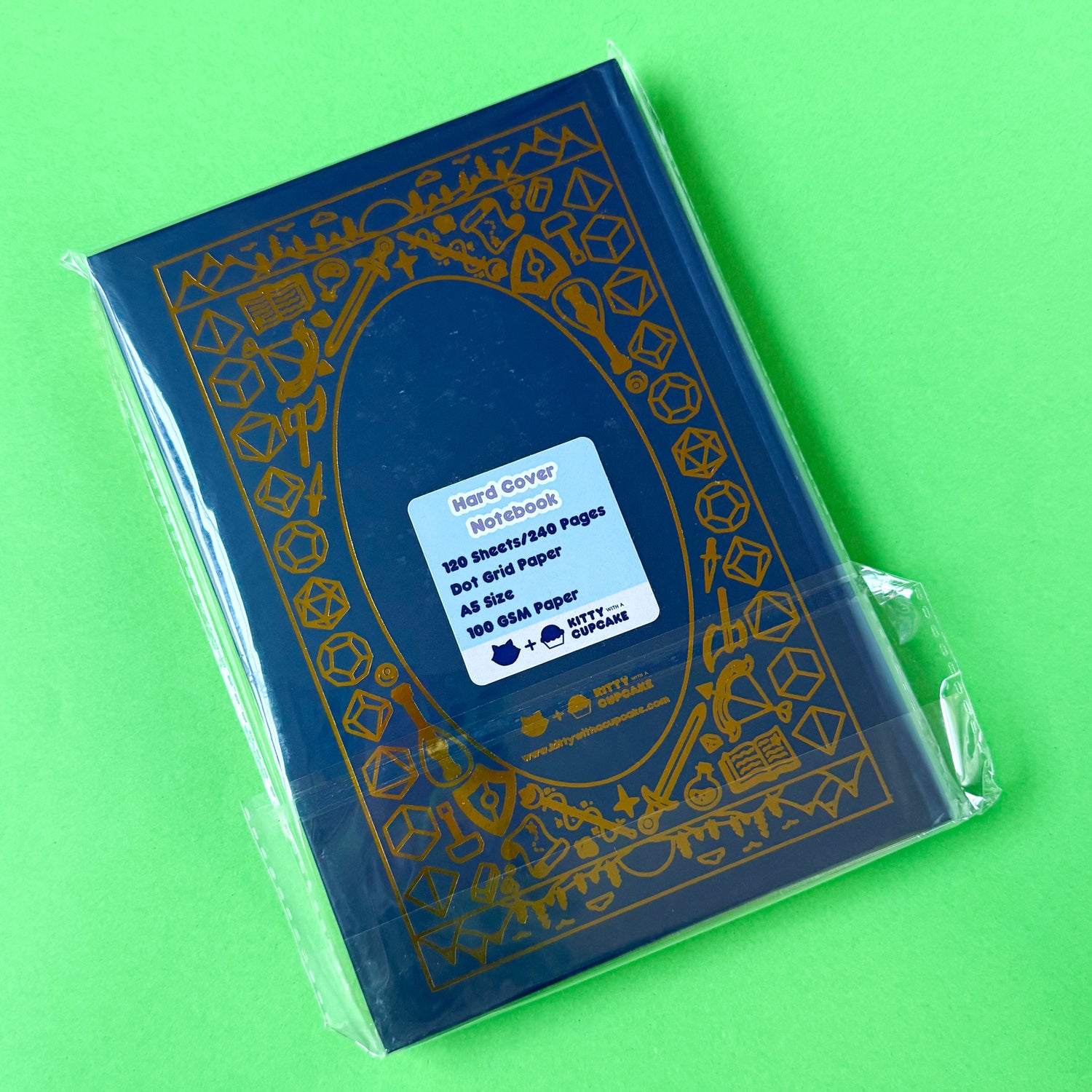 The back of the Adventure Journal in retail packaging; a plastic cover featuring a sticker with details of the specifications of the notebook.