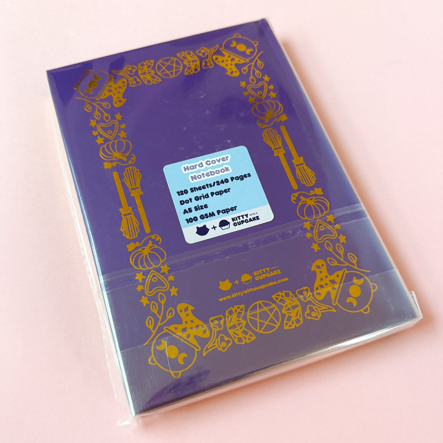 The back of the Book of Spells in retail packaging; a plastic cover featuring a sticker with details of the specifications of the notebook.