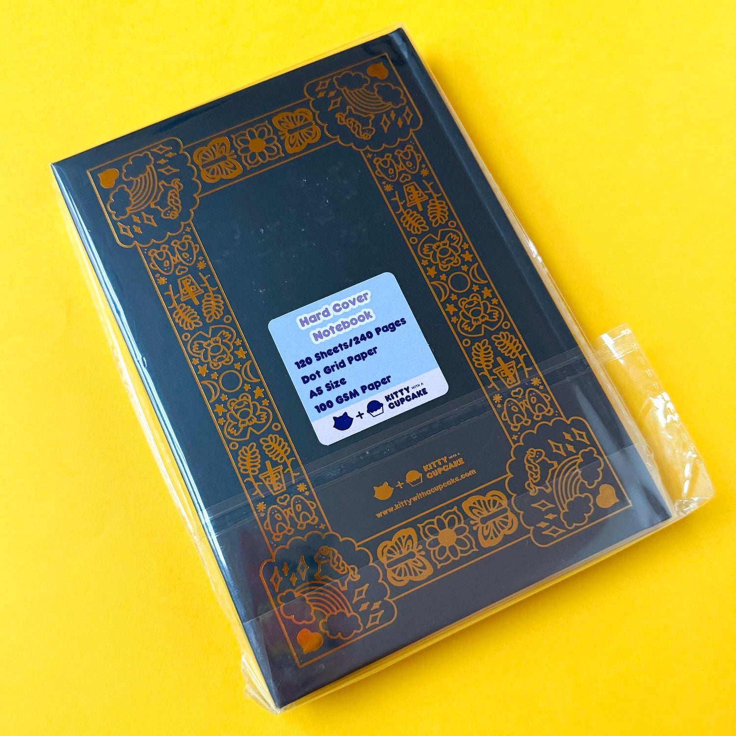 The back of the Gay Agenda in retail packaging; a plastic cover featuring a sticker with details of the specifications of the notebook.