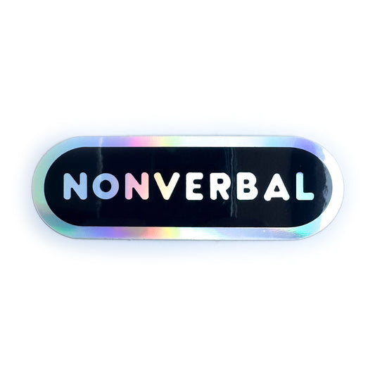 A black capsule shaped sticker with a holographic border and holographic bubble letters. 