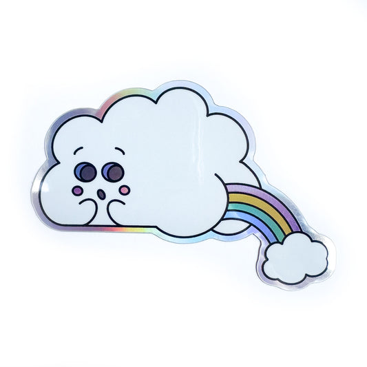 A holographic sticker in the shape of a cute cloud with a little booty that is farting out a rainbow with another cloud.