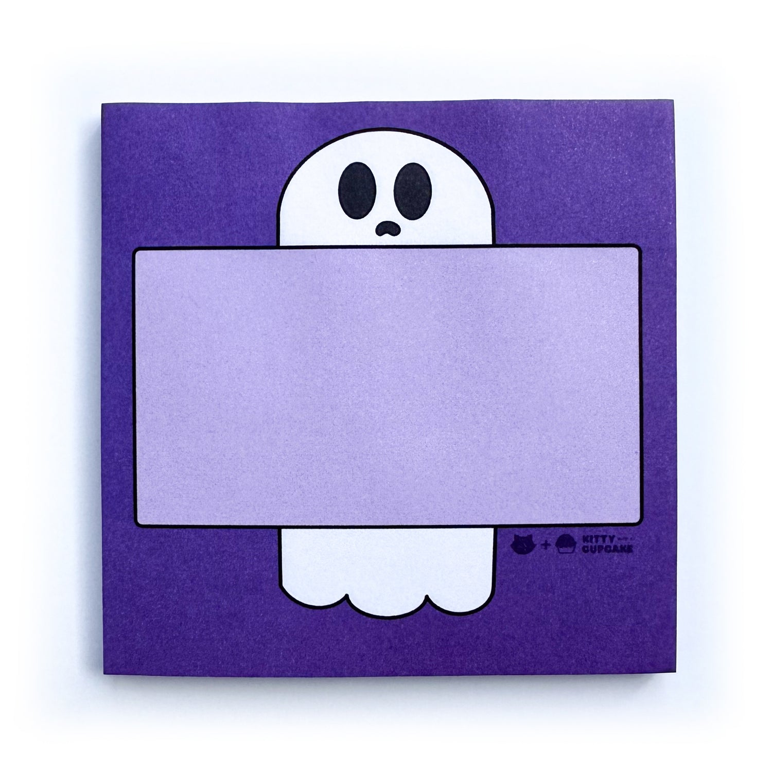 A purple square pad of sticky notes featuring a ghost holding a light purple box to write in.