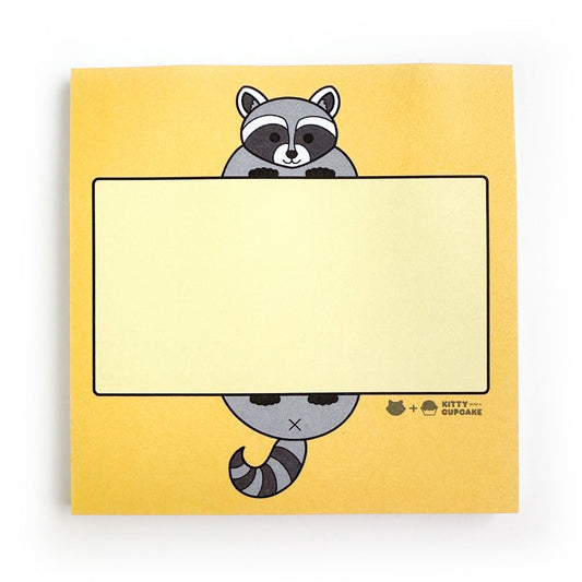 Square yellow sticky notes with a cute illustration of a raccoon holding a light yellow box for you to write in.