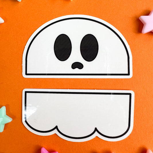 A sticker set of a ghost that has been cut in half horizontally, the top half is the head and the bottom part is the swoop bottom. The stickers are on an orange background star beads around them.