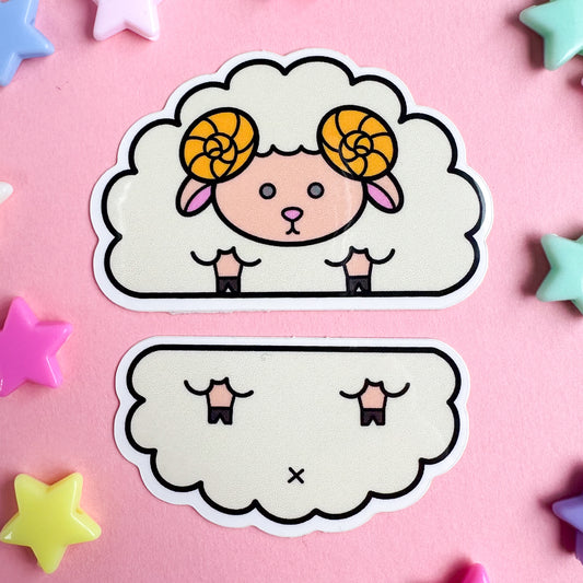 A pair of stickers that form a cute illustration of a sheep. The stickers are on a pink background with stars around it.