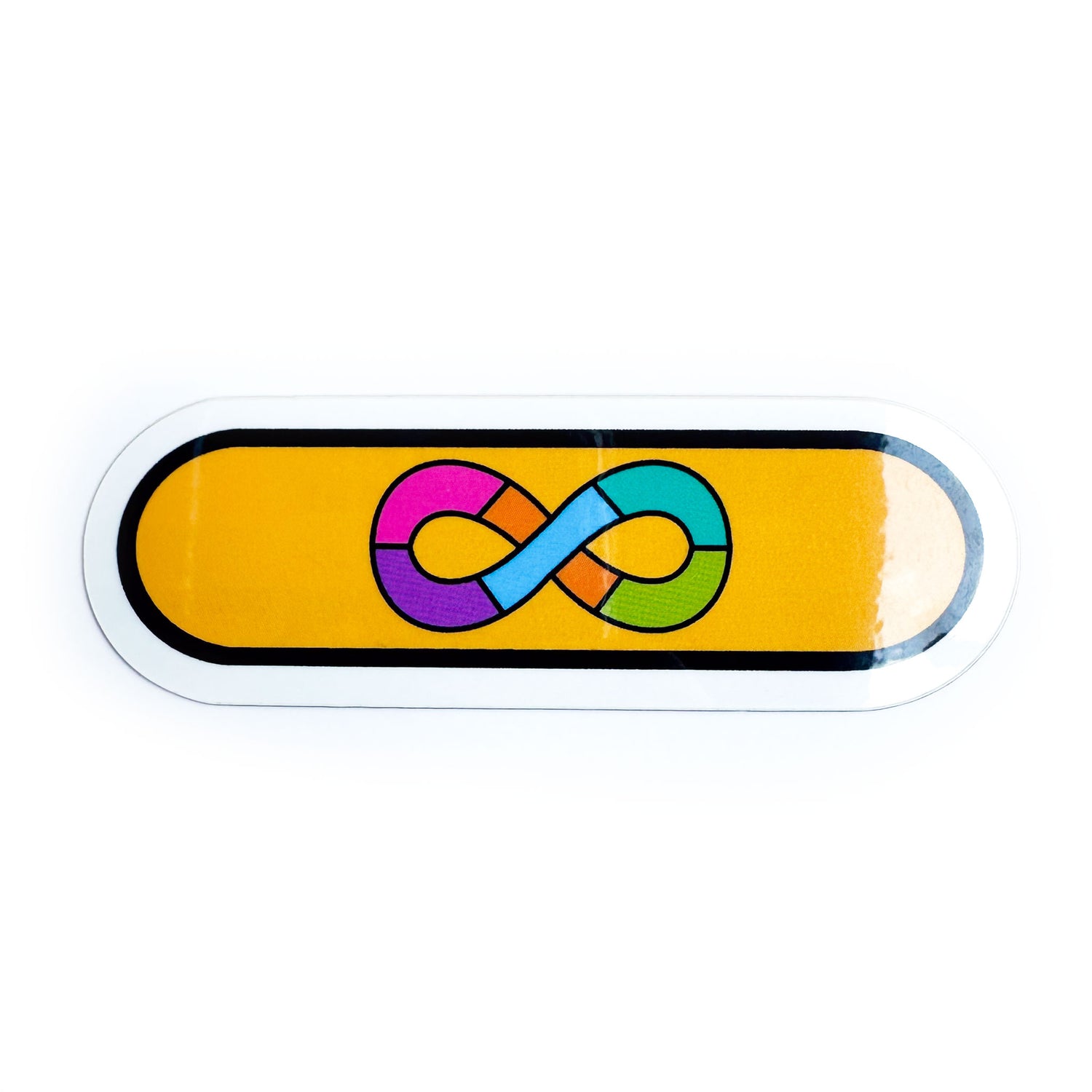 A capsule shaped sticker with the image of the Autistic Pride Flag on it, a rainbow infinity symbol with a gold background.