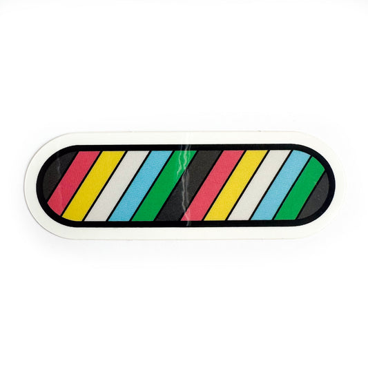 A capsule shaped sticker with diagonal stripes in the colors of the Disability Pride Flag.