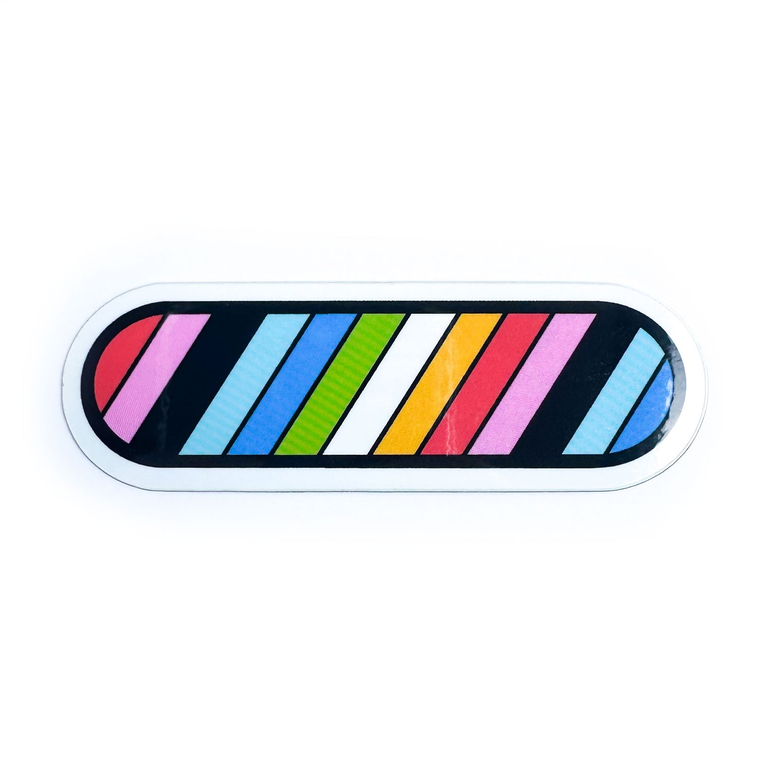 A capsule shaped sticker with diagonal stripes in the colors of the Queer Pride Flag.