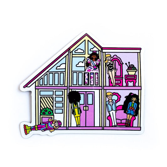 A sticker shaped like a Barbie DreamHouse in pinks and creams. There are various Barbie toys strewn about the house including the original bathing suit barbie, ken, birthday barbie, rollerblade barbie and more. 