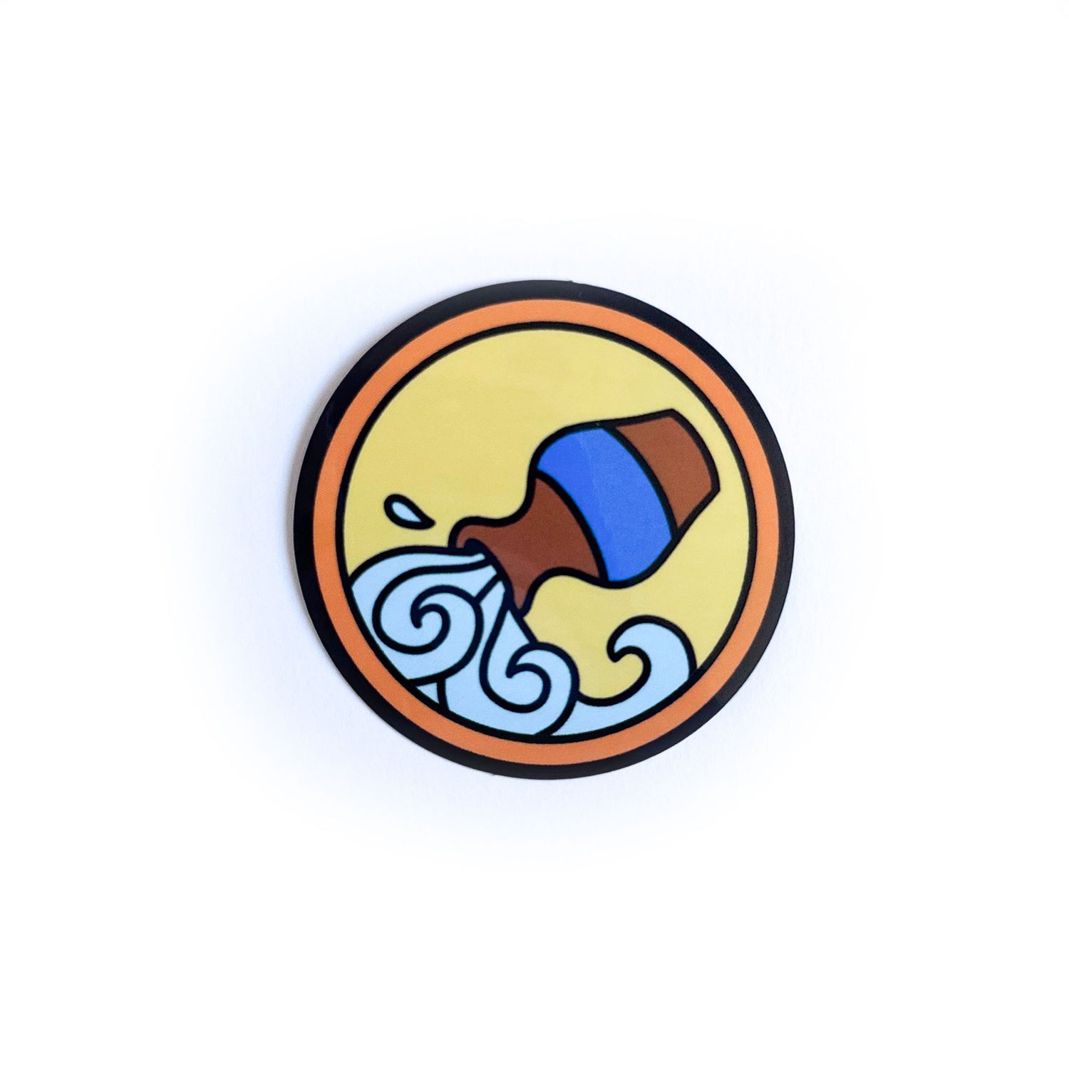 A circular vinyl sticker with the Aquarius zodiac symbol in a cute style on it. The symbol is a water vessel pouring water from it on a yellow background with an outer circle in orange.