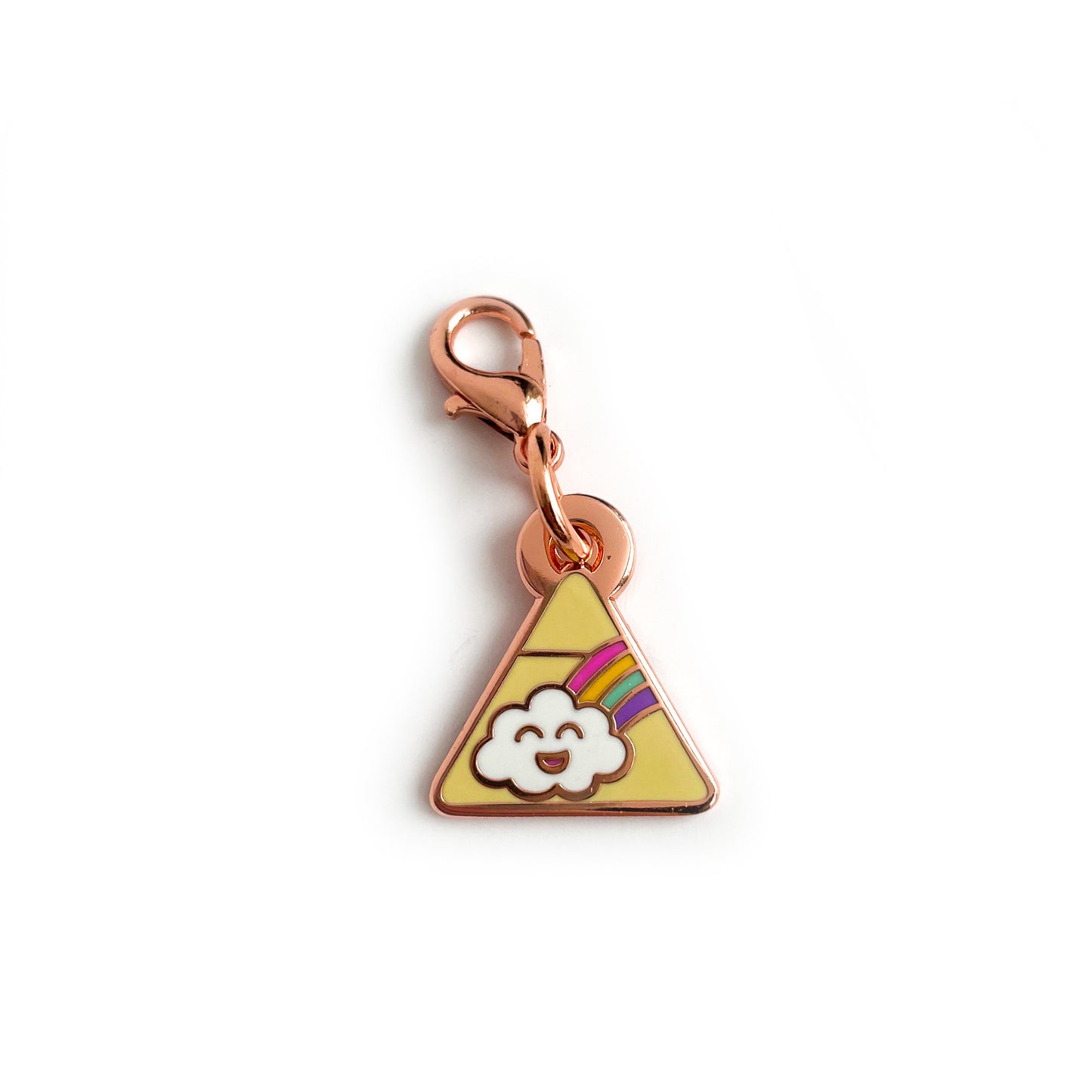 A triangle charm with a happy rainbow cloud on it. 
