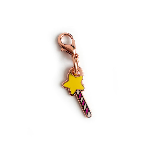 A lobster claw clasp charm of a cute star wand.
