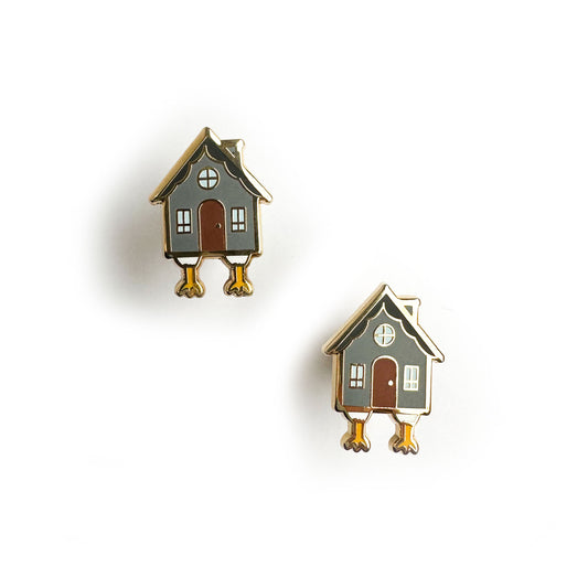 Enamel stud earrings shaped like Baba Yaga's house, a grey house with chicken feet