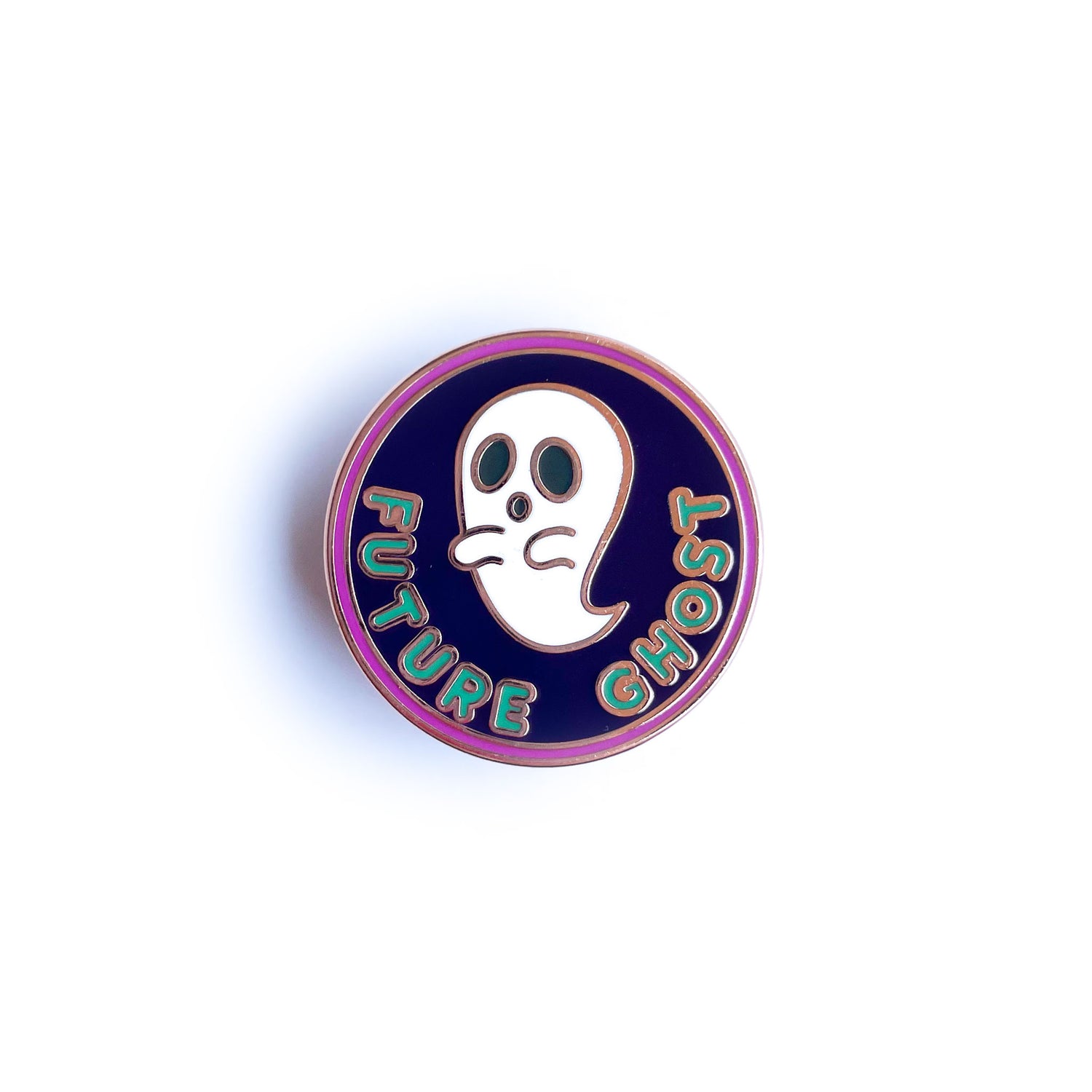 An circular enamel pin with a ghost on it that reads "Future Ghost"